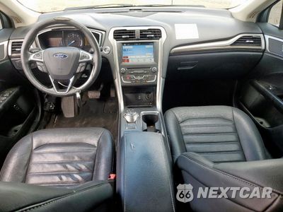 Zdjęcie 8 z 12 samochodu: 2017 FORD FUSION SE HYBRID VIN:3FA6P0LU0HR409038 - miniatura