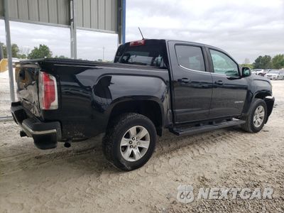 Trzecie zdjęcie samochodu z tyłu: 2016 GMC CANYON SLE VIN:1GTG5CE34G1391209 - miniatura