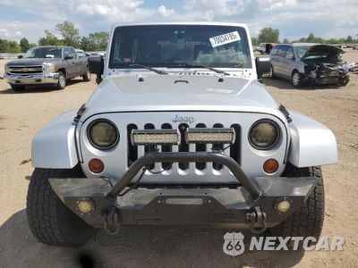 Piąte zdjęcie samochodu w środku: 2009 JEEP WRANGLER UNLIMITED SAHARA VIN:1J8GA59139L785963 - miniatura