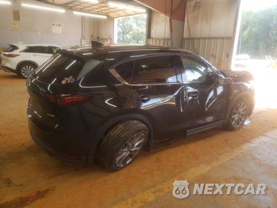 Trzecie zdjęcie samochodu z tyłu: 2021 MAZDA CX-5 GRAND TOURING VIN:JM3KFADM4M0402613 - miniatura