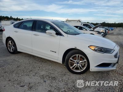 Czwarte zdjęcie samochodu z boku: 2018 FORD FUSION SE HYBRID VIN:3FA6P0LU5JR171726 - miniatura