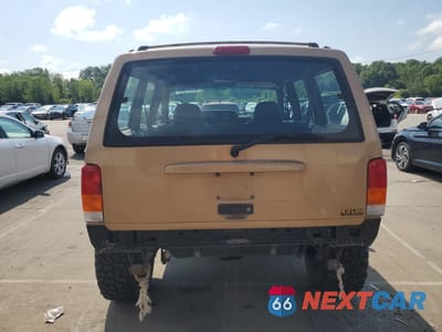 Zdjęcie 6 z 13 samochodu: 1999 JEEP CHEROKEE SPORT VIN:1J4FF68S4XL610682 - miniatura