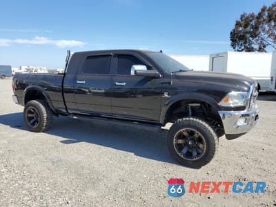 Czwarte zdjęcie samochodu z boku: 2018 DODGE RAM 3500 L - TRUCKS VIN:3C63R3ML0JG384956 - miniatura