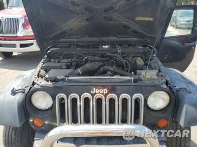 Zdjęcie 12 z 13 samochodu: 2009 JEEP WRANGLER UNLIMITED X VIN:1J4GA39109L727363 - miniatura