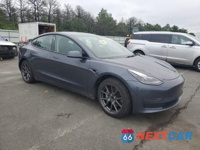 Czwarte zdjęcie samochodu z boku: 2022 TESLA MODEL 3 VIN:5YJ3E1EA8NF202146 - miniatura