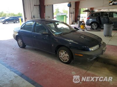 Czwarte zdjęcie samochodu z boku: 1999 SATURN SL1 VIN:1G8ZH5288XZ178819 - miniatura