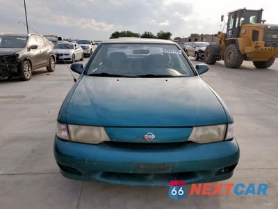 Piąte zdjęcie samochodu w środku: 1999 NISSAN SENTRA BASE VIN:1N4AB41D4XC717507 - miniatura
