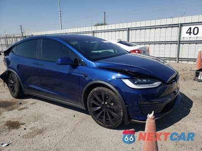 Czwarte zdjęcie samochodu z boku: 2022 TESLA MODEL X VIN:7SAXCBE60NF334071 - miniatura