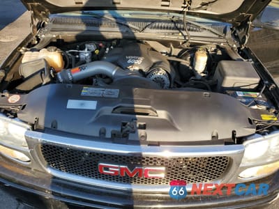 Zdjęcie 11 z 14 samochodu: 2002 GMC SIERRA K1500 DENALI VIN:2GTFK69U921389080 - miniatura