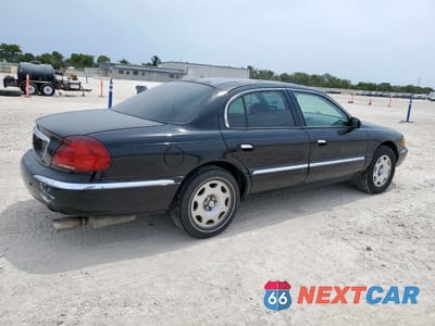 Trzecie zdjęcie samochodu z tyłu: 1999 LINCOLN CONTINENTAL VIN:1LNHM97V9XY634170 - miniatura