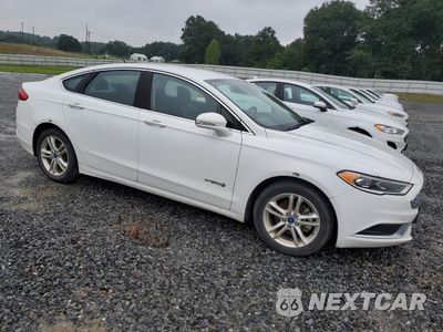 Czwarte zdjęcie samochodu z boku: 2018 FORD FUSION SE HYBRID VIN:3FA6P0LU7JR171792 - miniatura