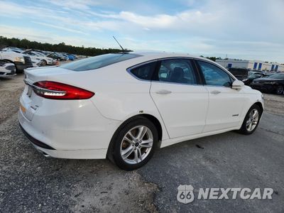 Trzecie zdjęcie samochodu z tyłu: 2018 FORD FUSION SE HYBRID VIN:3FA6P0LU4JR278749 - miniatura