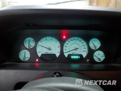 Zdjęcie 9 z 13 samochodu: 2004 JEEP GRAND CHEROKEE LAREDO VIN:1J4GW58S04C408898 - miniatura
