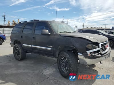 Czwarte zdjęcie samochodu z boku: 2000 GMC YUKON VIN:1GKEC13T2YJ127996 - miniatura