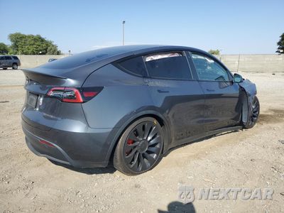 Trzecie zdjęcie samochodu z tyłu: 2022 TESLA MODEL Y VIN:7SAYGDEF5NF490711 - miniatura