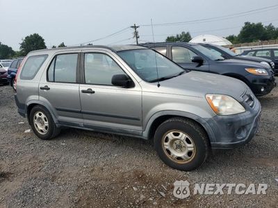 Czwarte zdjęcie samochodu z boku: 2005 HONDA CR-V LX VIN:JHLRD685X5C005357 - miniatura