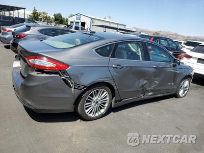 Trzecie zdjęcie samochodu z tyłu: 2014 FORD FUSION SE HYBRID VIN:3FA6P0LU6ER199976 - miniatura