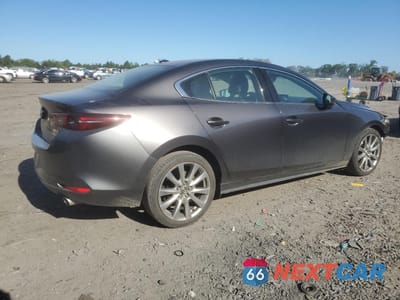 Trzecie zdjęcie samochodu z tyłu: 2020 MAZDA 3 PREMIUM VIN:3MZBPAEM9LM116852 - miniatura