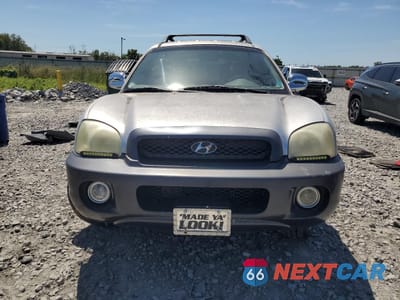Piąte zdjęcie samochodu w środku: 2001 HYUNDAI SANTA FE GLS VIN:KM8SC83D31U029432 - miniatura