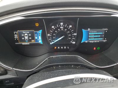 Zdjęcie 9 z 12 samochodu: 2017 FORD FUSION SE HYBRID VIN:3FA6P0LU3HR359543 - miniatura