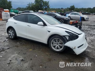 Czwarte zdjęcie samochodu z boku: 2022 TESLA MODEL Y VIN:7SAYGDEE2NF379959 - miniatura