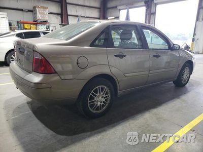 Trzecie zdjęcie samochodu z tyłu: 2005 FORD FOCUS ZX4 VIN:1FAFP34N35W214018 - miniatura
