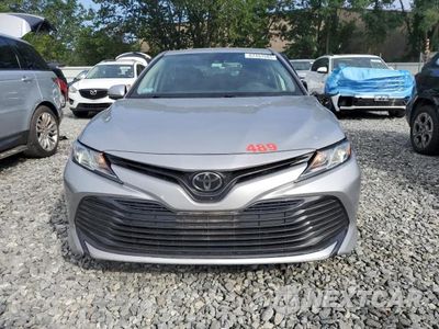 Piąte zdjęcie samochodu w środku: 2019 TOYOTA CAMRY L VIN:4T1B11HK9KU188395 - miniatura