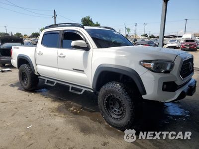 Czwarte zdjęcie samochodu z boku: 2019 TOYOTA TACOMA DOUBLE CAB VIN:3TMAZ5CN1KM105581 - miniatura