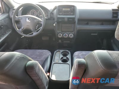 Zdjęcie 8 z 13 samochodu: 2004 HONDA CR-V LX VIN:JHLRD68484C001989 - miniatura