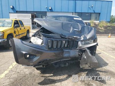 Piąte zdjęcie samochodu w środku: 2015 JEEP GRAND CHEROKEE LAREDO VIN:1C4RJFAG5FC758359 - miniatura
