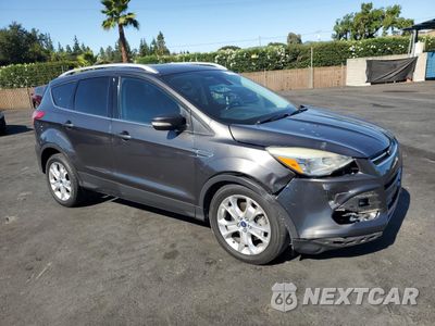 Czwarte zdjęcie samochodu z boku: 2015 FORD ESCAPE TITANIUM VIN:1FMCU0J92FUC43398 - miniatura