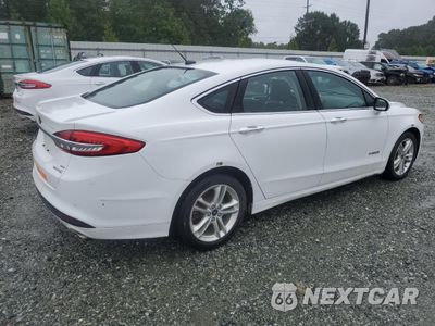 Trzecie zdjęcie samochodu z tyłu: 2018 FORD FUSION SE HYBRID VIN:3FA6P0LU1JR278675 - miniatura