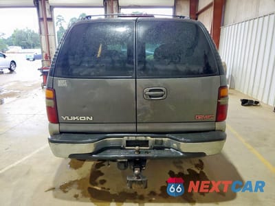 Zdjęcie 6 z 15 samochodu: 2000 GMC YUKON VIN:1GKEC13V7YJ175866 - miniatura