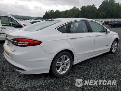 Trzecie zdjęcie samochodu z tyłu: 2018 FORD FUSION SE HYBRID VIN:3FA6P0LU2JR171795 - miniatura