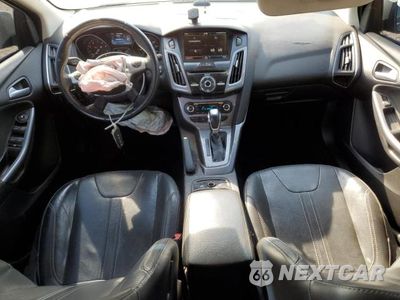 Zdjęcie 8 z 13 samochodu: 2014 FORD FOCUS TITANIUM VIN:1FADP3N26EL230436 - miniatura