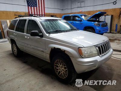 Czwarte zdjęcie samochodu z boku: 2004 JEEP GRAND CHEROKEE LAREDO VIN:1J4GW58S04C408898 - miniatura