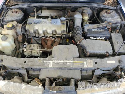 Zdjęcie 11 z 12 samochodu: 1999 SATURN SL1 VIN:1G8ZH5288XZ178819 - miniatura