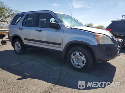 Czwarte zdjęcie samochodu z boku: 2004 HONDA CR-V LX VIN:JHLRD68464C015034 - miniatura