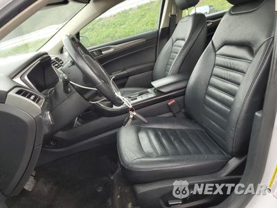 Zdjęcie 7 z 12 samochodu: 2017 FORD FUSION SE HYBRID VIN:3FA6P0LU2HR359582 - miniatura