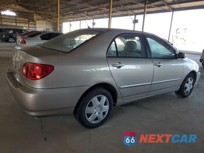 Trzecie zdjęcie samochodu z tyłu: 2003 TOYOTA COROLLA CE VIN:1NXBR32E43Z013013 - miniatura