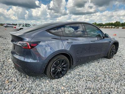 Trzecie zdjęcie samochodu z tyłu: 2023 TESLA MODEL Y VIN:7SAYGDEE2PA058214 - miniatura
