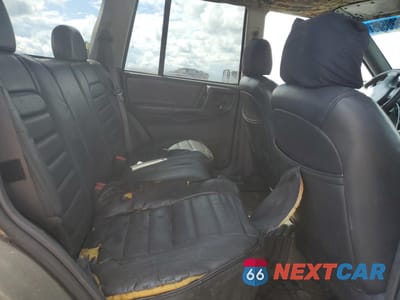 Zdjęcie 10 z 12 samochodu: 1997 JEEP GRAND CHEROKEE LAREDO VIN:1J4GZ58S9VC541295 - miniatura