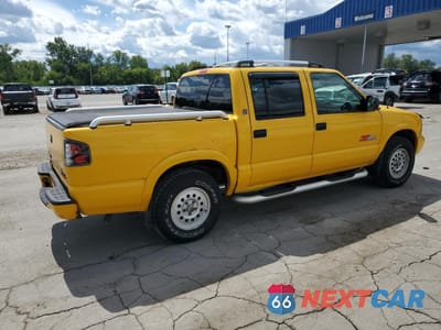 Trzecie zdjęcie samochodu z tyłu: 2003 GMC SONOMA VIN:1GTDT13X33K104711 - miniatura
