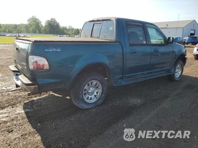 Trzecie zdjęcie samochodu z tyłu: 2001 FORD F150 VIN:1FTRW08L11KE24569 - miniatura