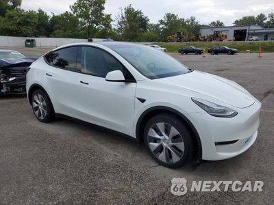 Czwarte zdjęcie samochodu z boku: 2023 TESLA MODEL Y VIN:7SAYGAEE1PF596629 - miniatura