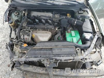 Zdjęcie 11 z 12 samochodu: 2002 NISSAN ALTIMA BASE VIN:1N4AL11D32C105058 - miniatura