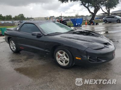 Czwarte zdjęcie samochodu z boku: 1999 PONTIAC FIREBIRD VIN:2G2FS22K7X2232302 - miniatura