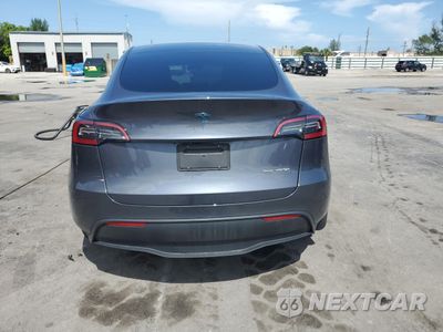 Zdjęcie 6 z 14 samochodu: 2023 TESLA MODEL Y VIN:7SAYGDEE8PF699998 - miniatura