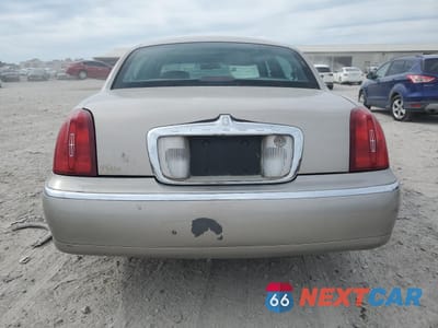 Zdjęcie 6 z 15 samochodu: 2000 LINCOLN TOWN CAR EXECUTIVE VIN:1LNHM81W0YY784410 - miniatura