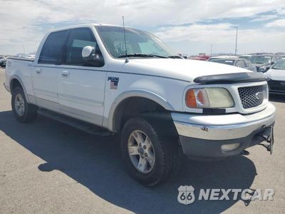 Czwarte zdjęcie samochodu z boku: 2002 FORD F150 SUPERCREW VIN:1FTRW08L02KE04346 - miniatura